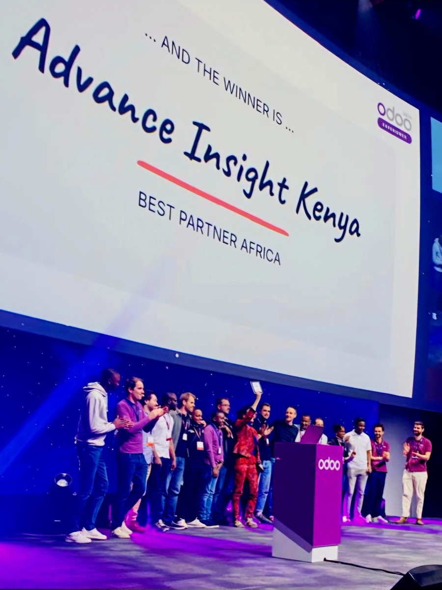 The Advance Insight Kenya team on stage receiving the Best Partner Africa award at Odoo Experience